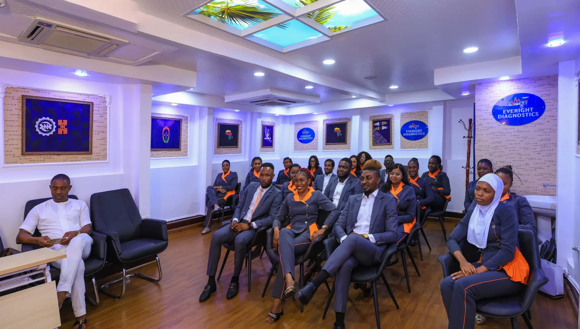 The Everight Diagnostics team in the conference room at the Abuja headquarters
